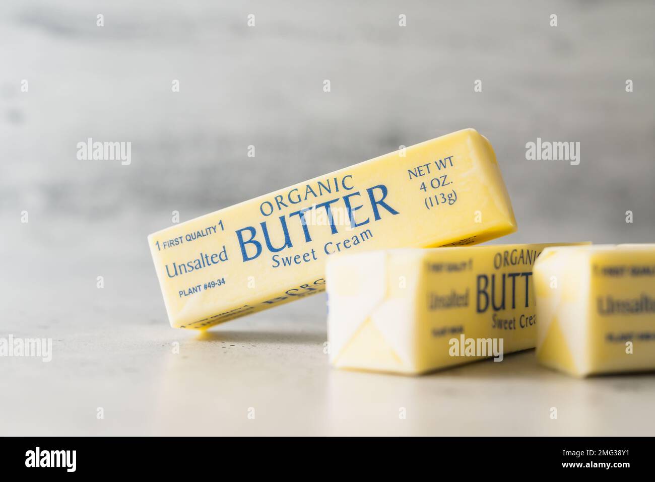 Butter sticks closeup. Wrapped organic unsalted butter sticks on a