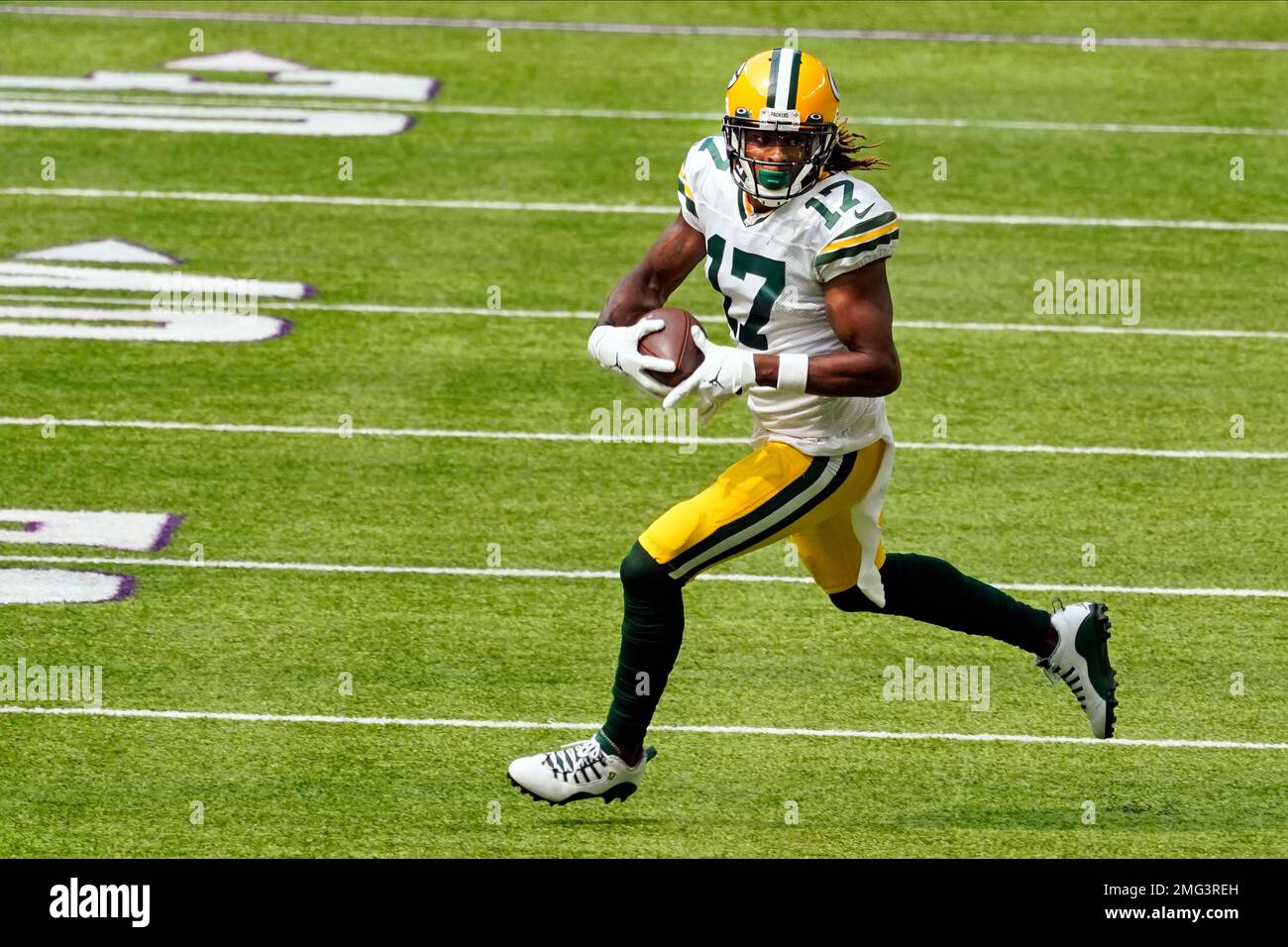 Green Bay Packers wide receiver Davante Adams (17) carries the ball in the first half of an NFL football game, against the Minnesota Vikings, Sunday, Sept. 13, 2020, in Minneapolis. (AP Photo/Jim Mone) Stock Photo