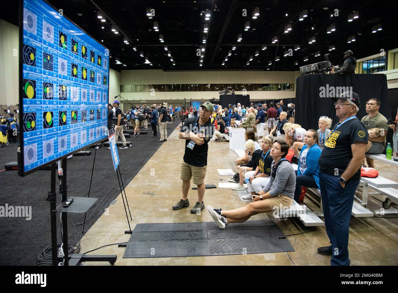 ORLANDO, Fla. (Aug. 21, 2022) Spectators view shot results as athletes