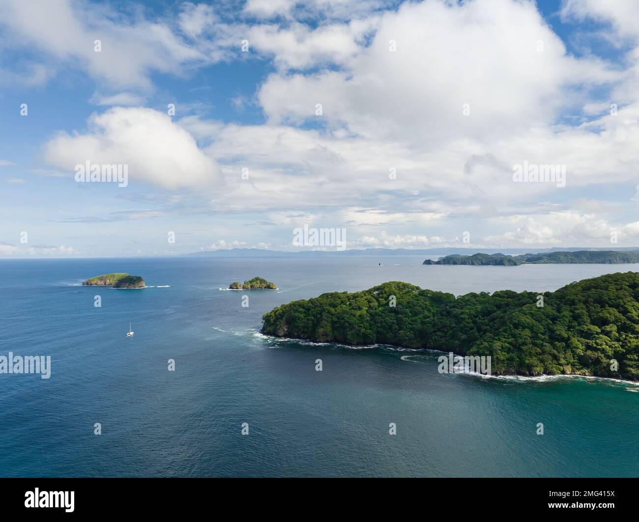Aerial view of the vibrant green coast along the Gulf of Papagayo, Guanacaste Province in northwestern Costa Rica. Stock Photo