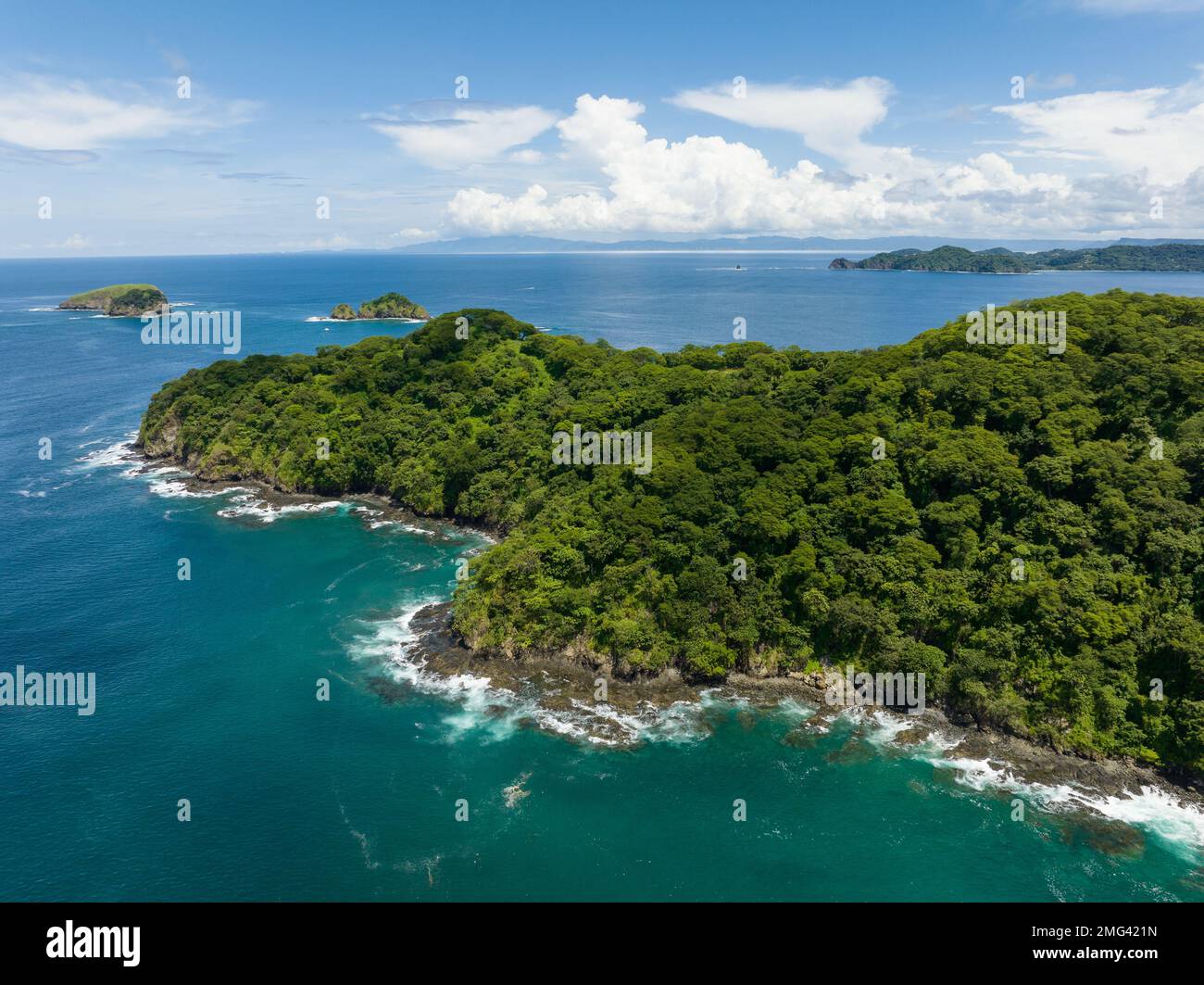 Aerial view of the vibrant green coast along the Gulf of Papagayo, Guanacaste Province in northwestern Costa Rica. Stock Photo