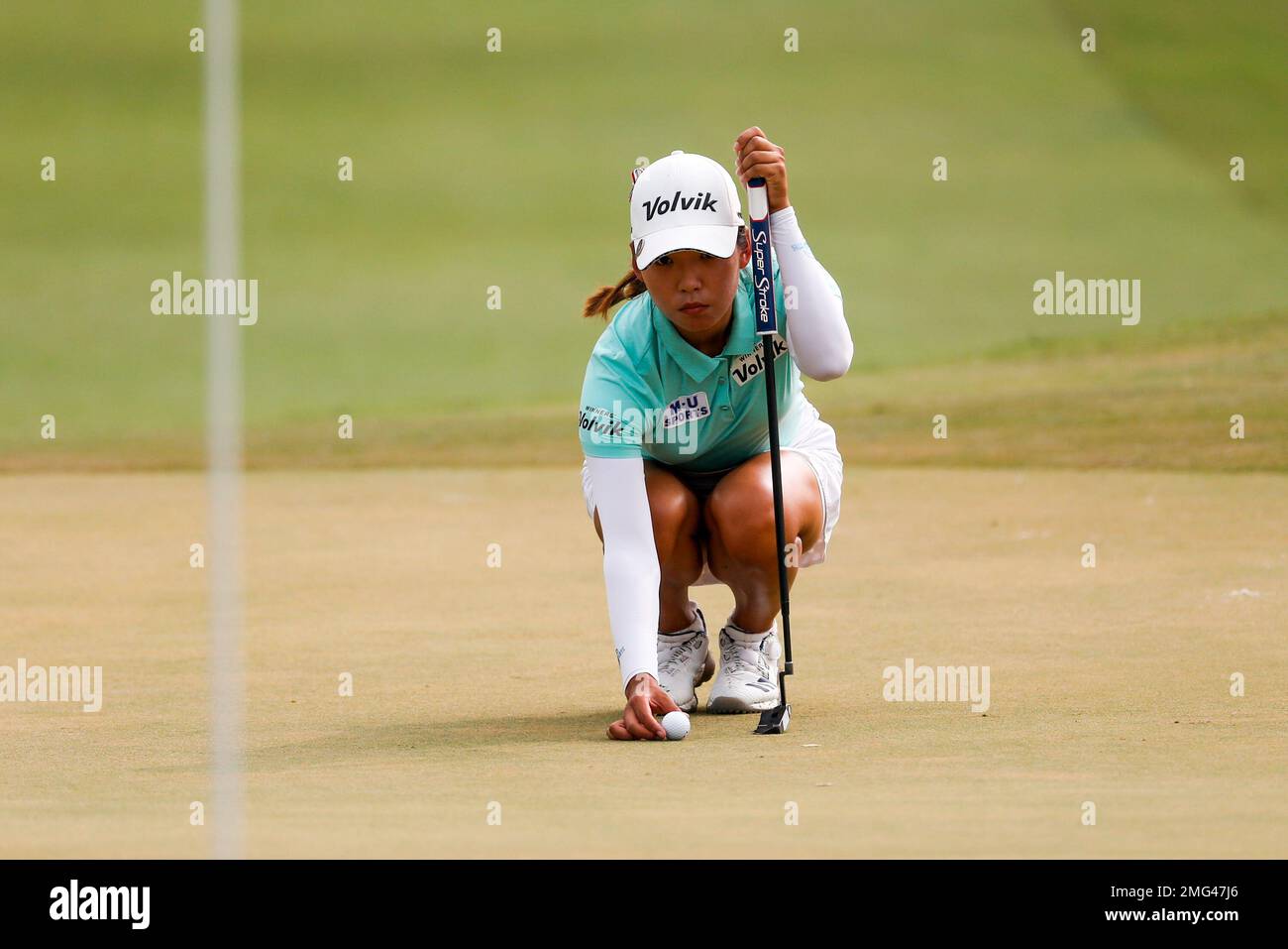 Mi Hyang Lee of South Korea, lines up her shot on the first hole during