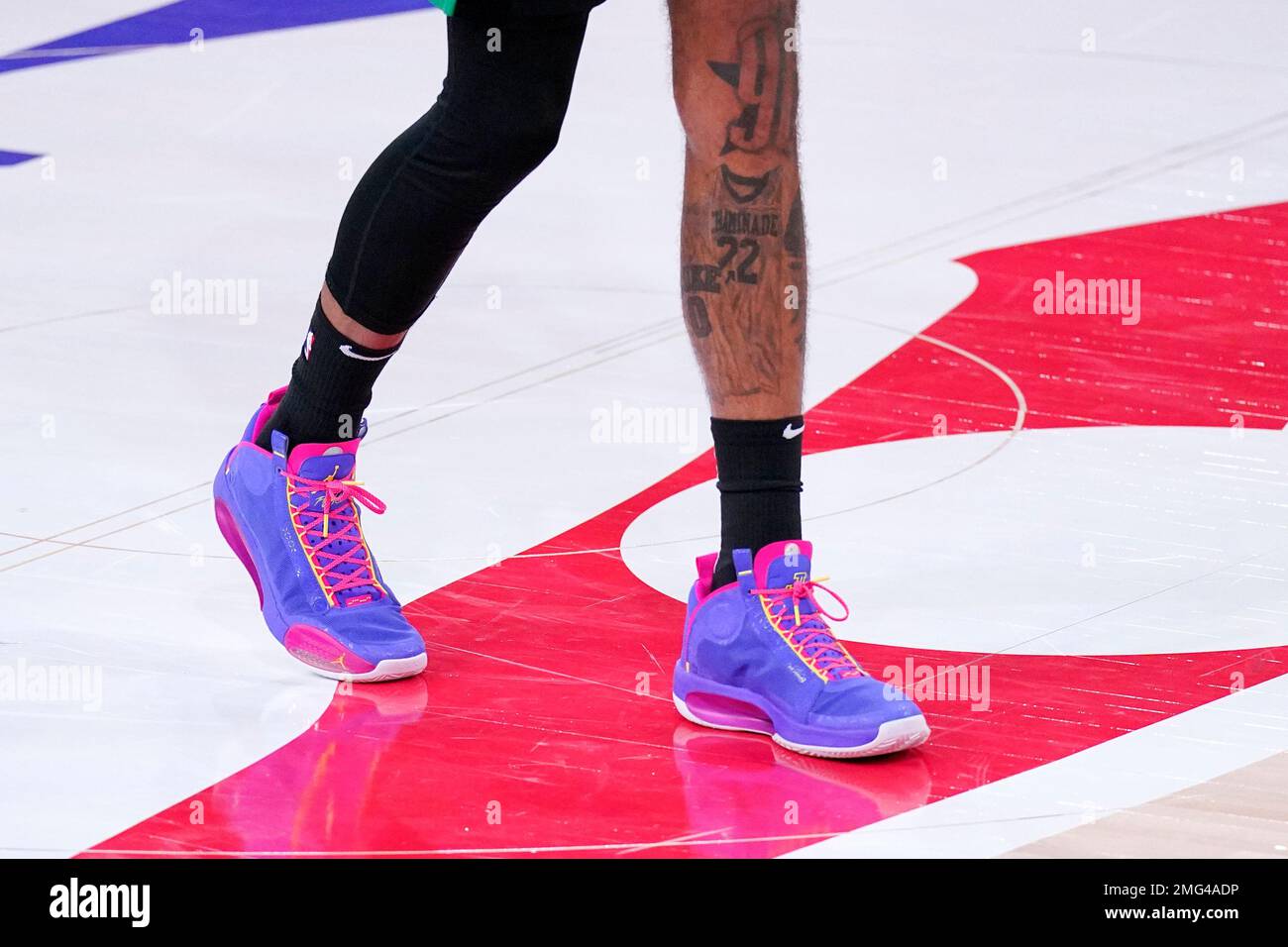 The shoes of Boston Celtics' Jayson Tatum are seen as he walks on