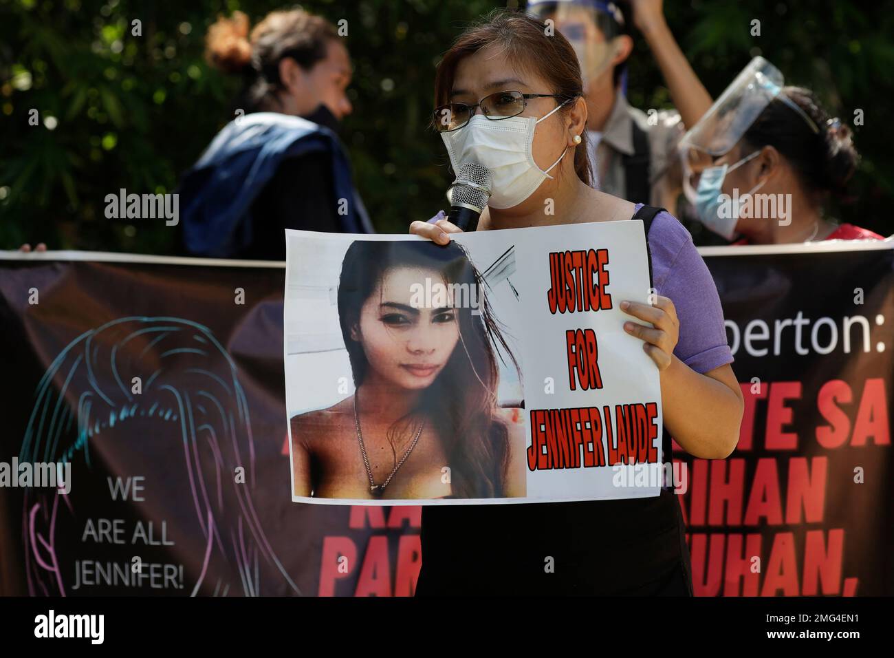 A Protester Holds A Slogan With A Photo Of The Killed Transgender 