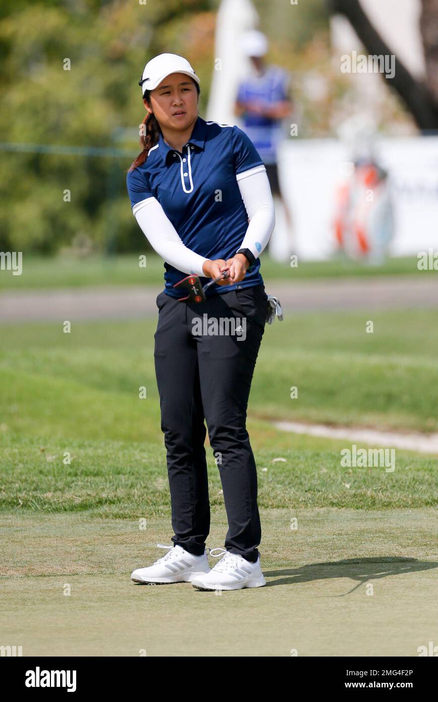 Jing Yan of China watches her shot during the first round of the LPGA