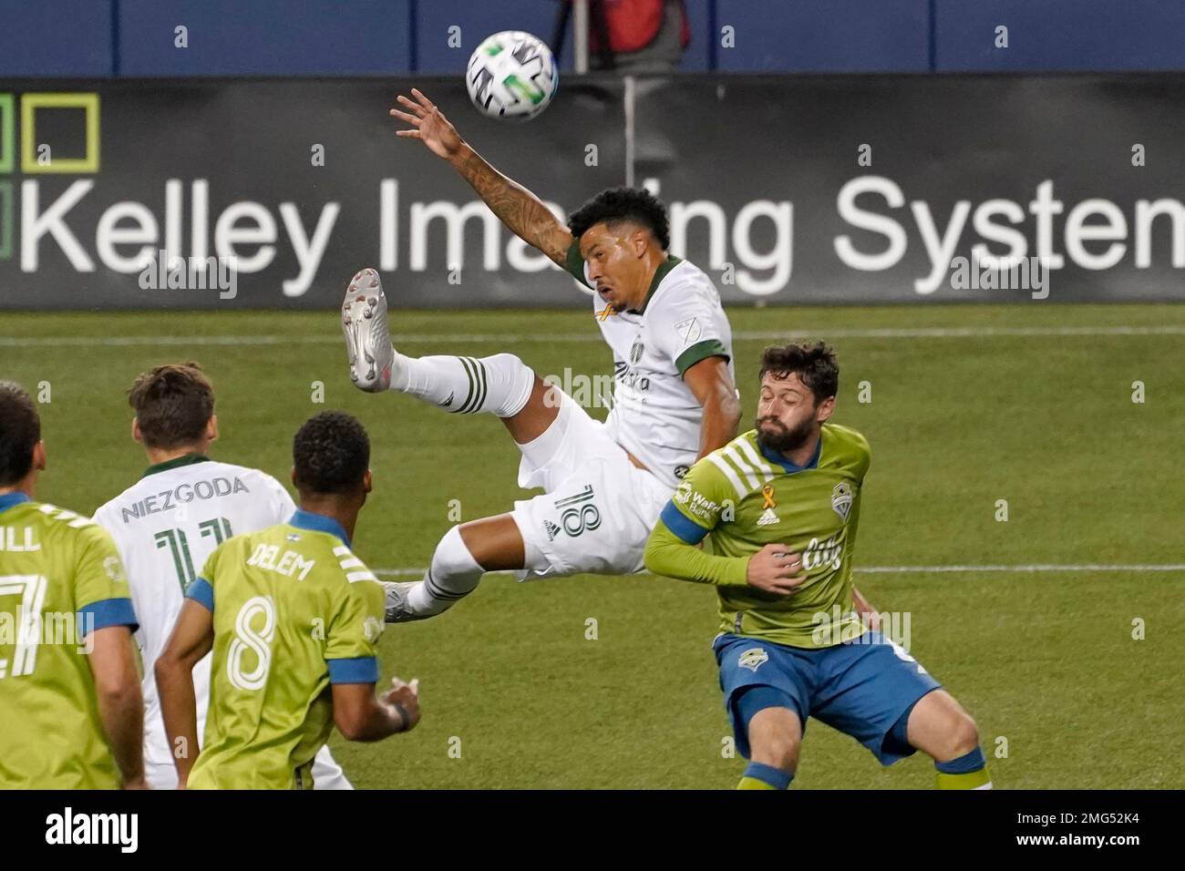 Portland Timbers defender Julio Cascante (18) makes a bicycle kick in