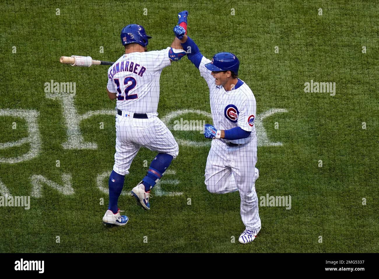 Chicago Cubs' Anthony Rizzo, right, celebrates with Kyle Schwarber ...