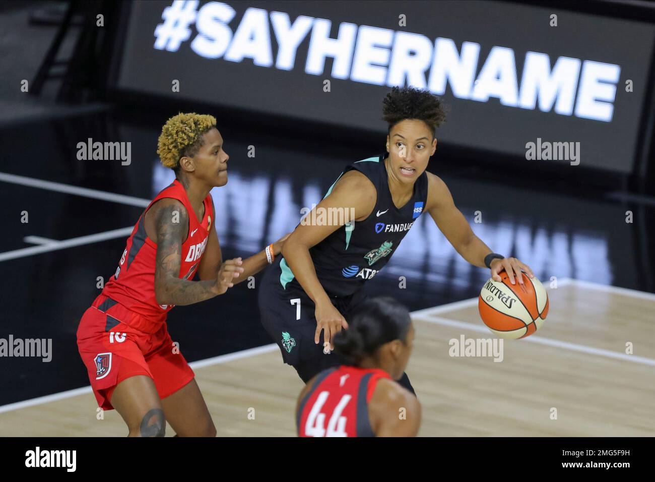 New York Liberty's Layshia Clarendon (7) is defended by Atlanta Dream's