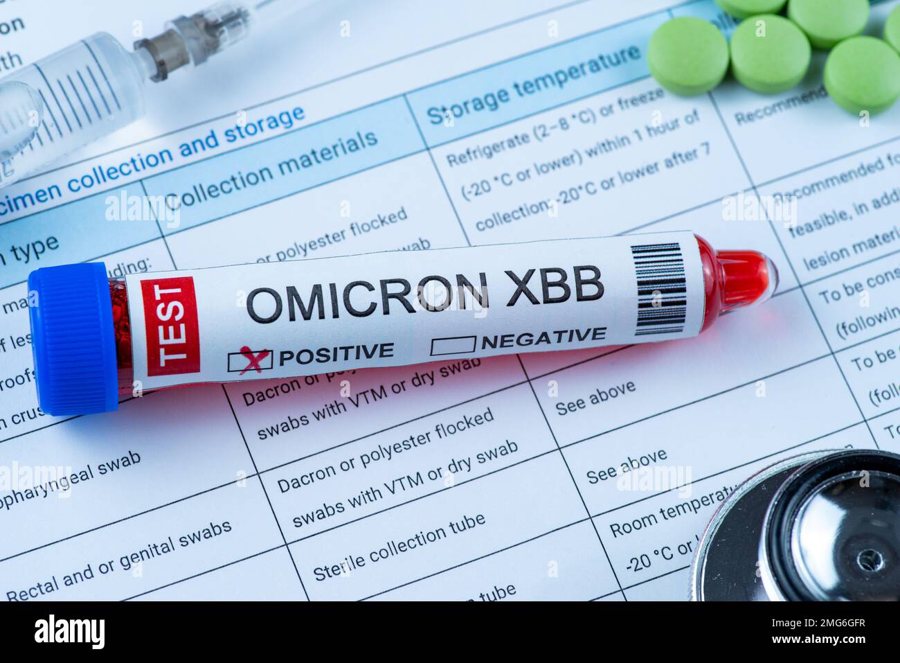 Test tube labelled 'OMICRON XBB variant test positive' Stock Photo