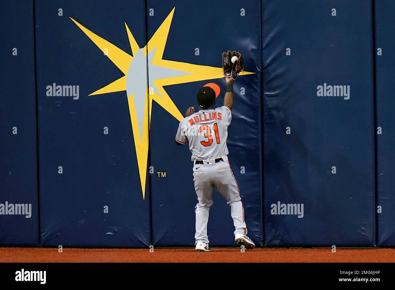 Baltimore Orioles center fielder Cedric Mullins (31) makes the catch on a  fly out by Tampa Bay Rays' Michael Perez during the eighth inning of a  baseball game Tuesday, Aug. 25, 2020