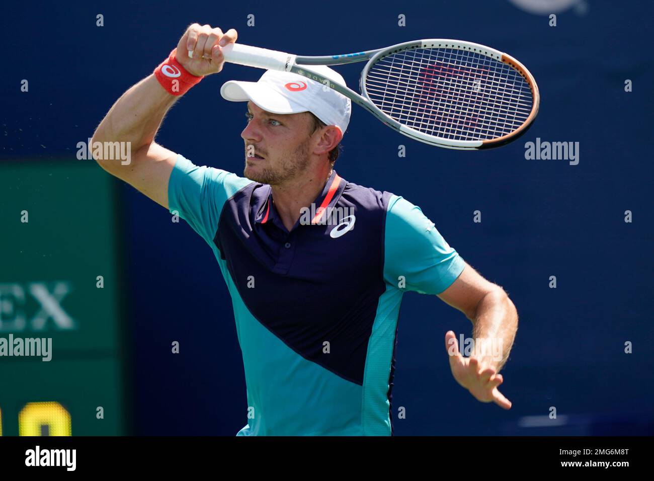 David Goffin, of Belgium, returns a shot from Jan-Lennard Struff, of German, during the third round at the Western and Southern Open tennis tournament Tuesday, Aug