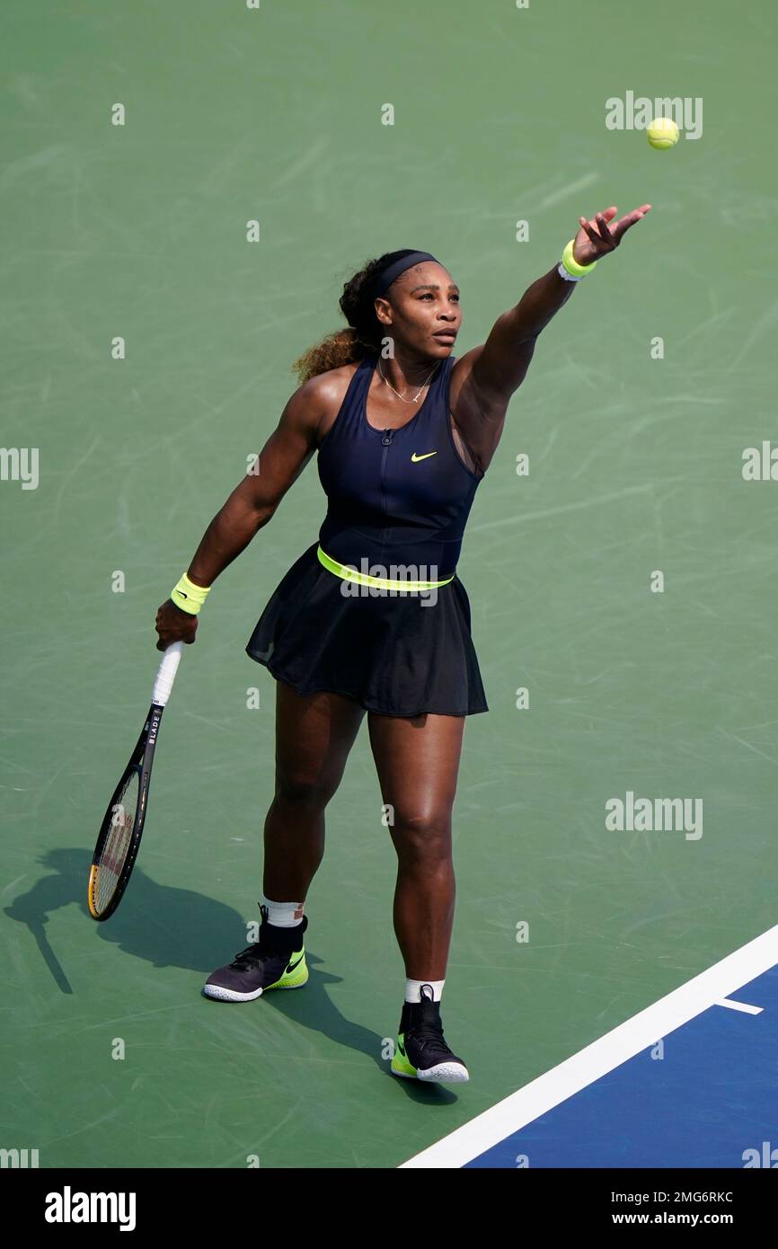 Serena Williams serves to Arantxa Rus, of the Netherlands, during the  second round at the Western & Southern Open tennis tournament Monday, Aug.  24, 2020, in New York. (AP Photo/Frank Franklin II