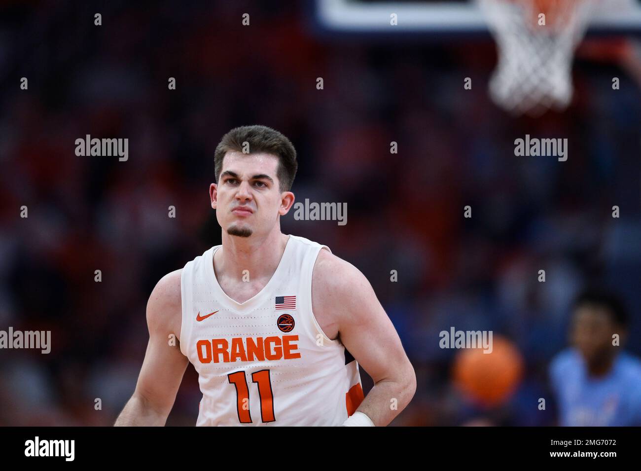 Syracuse guard Joseph Girard III (11) reacts during the first half of