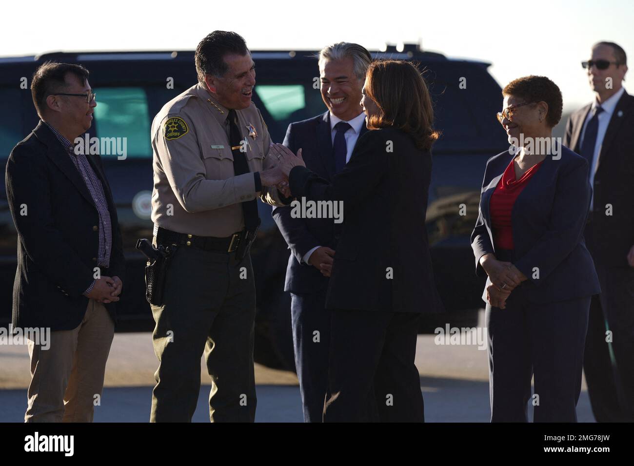 (L-R) LA County Supervisor Hilda Solis, Monterey Park Mayor Henry Lo, LA County Sheriff Robert Luna, Attorney General Robert Bonta, and Los Angeles Mayor Karen Bass greet US Vice President Kamala Harris as she arrives at Los Angeles International Airport in Los Angeles, California, USA, 25 January 2023. Vice President Harris is visiting a memorial and families of a mass shooting that happened in Monterey Park, CA on Saturday 21 2023, leaving 11 dead and 10 injured. Stock Photo