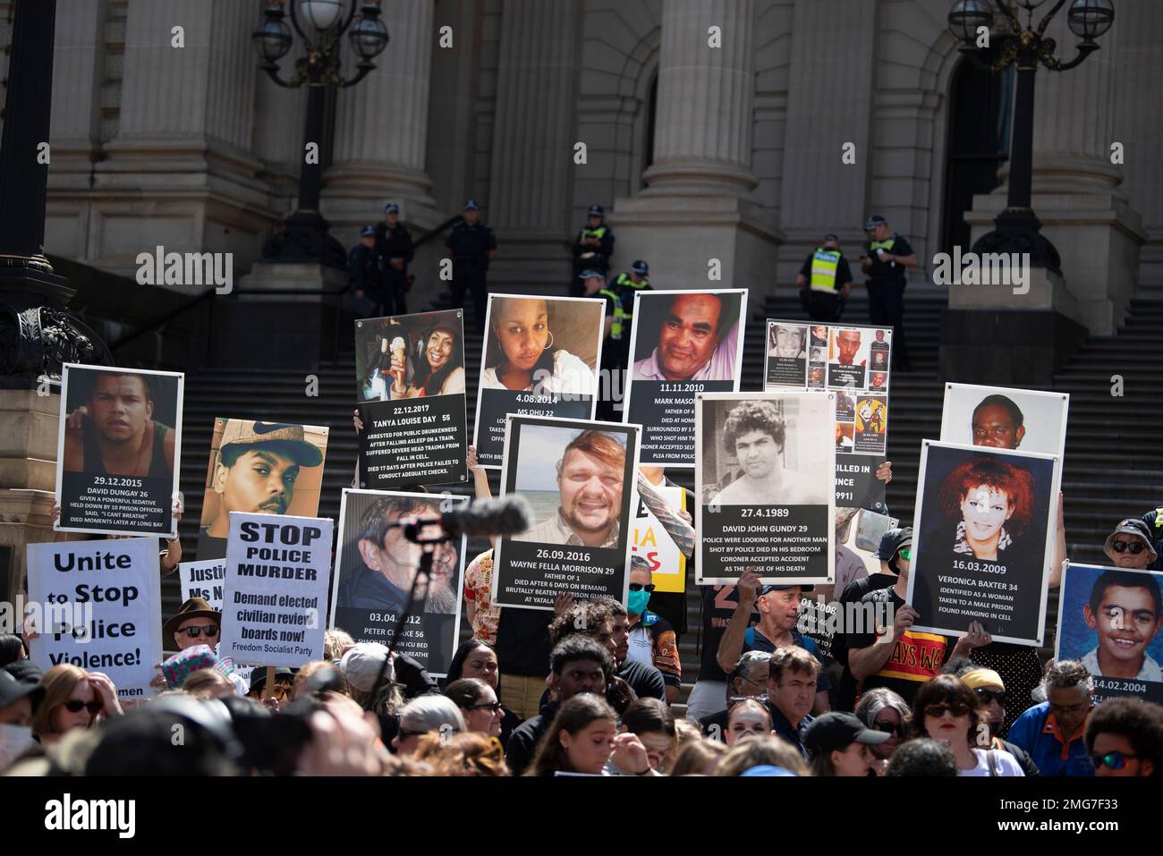Melbourne, Australia. 26th January 2023, Melbourne, Australia. Signs of Indigenous Australians who have died in police custody are held at the Invasion Day rally. Organisers call for treaties, land rights, an end to indigenous deaths in police custody and climate justice. Credit: Jay Kogler/Alamy Live News Credit: Jay Kogler/Alamy Live News Stock Photo