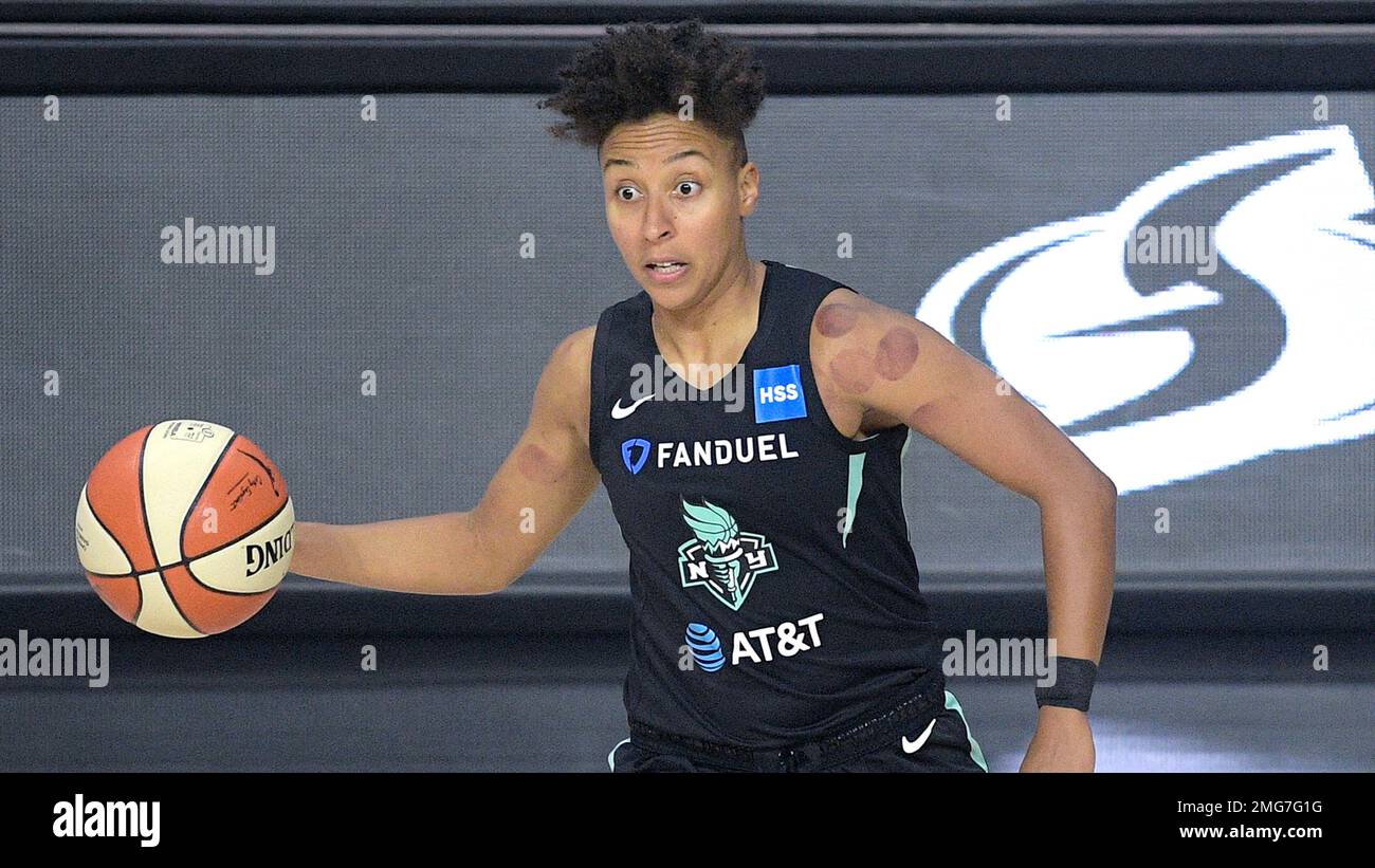 New York Liberty guard Layshia Clarendon (7) passes the ball during the