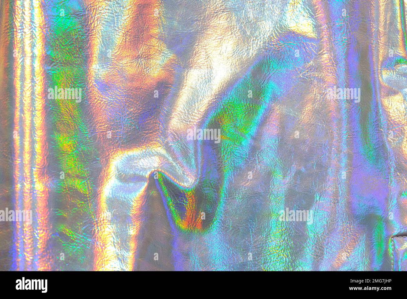 Holographic metallic background.metallic texture with iridescent gradients. wallpaper In silver, purple and green colors.metal holographic material Stock Photo