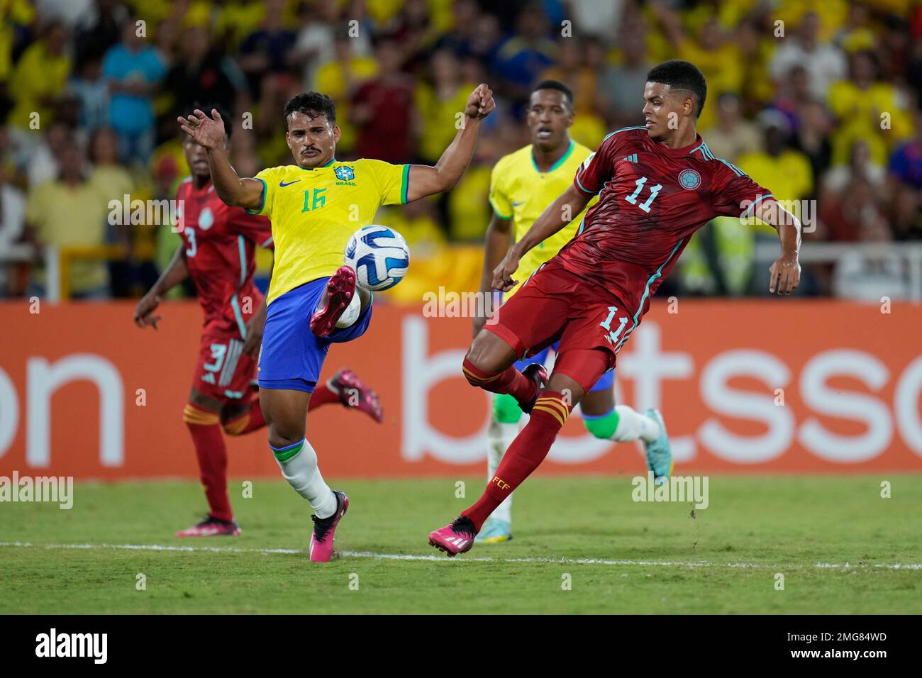 Colombia's Ricardo Caraballo, right, and Brazil's Kaiki Bruno duel for