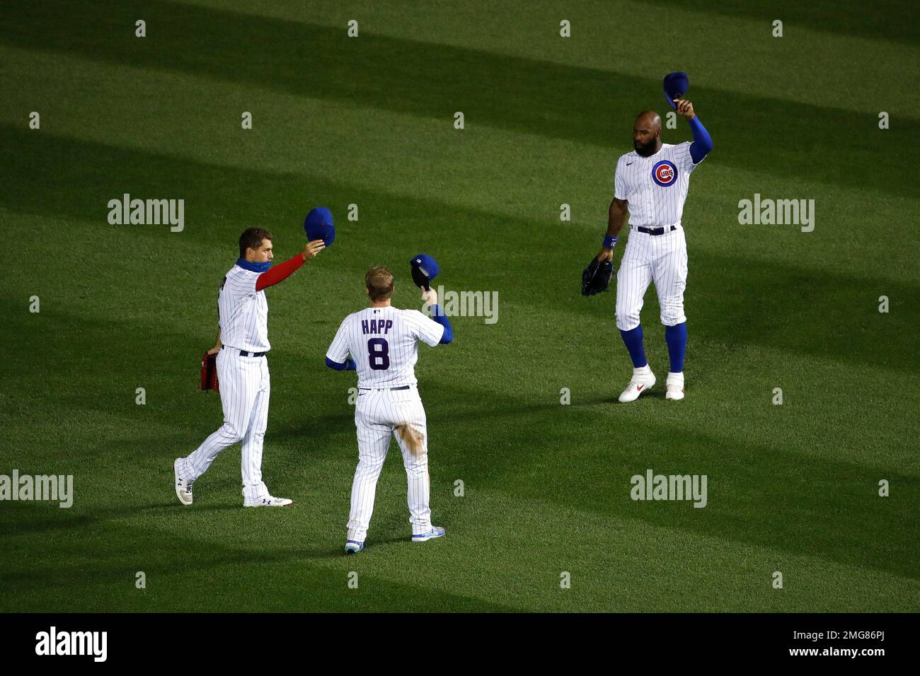 The Chicago Cubs outfielders Albert Almora Jr., left, Ian Happ, center