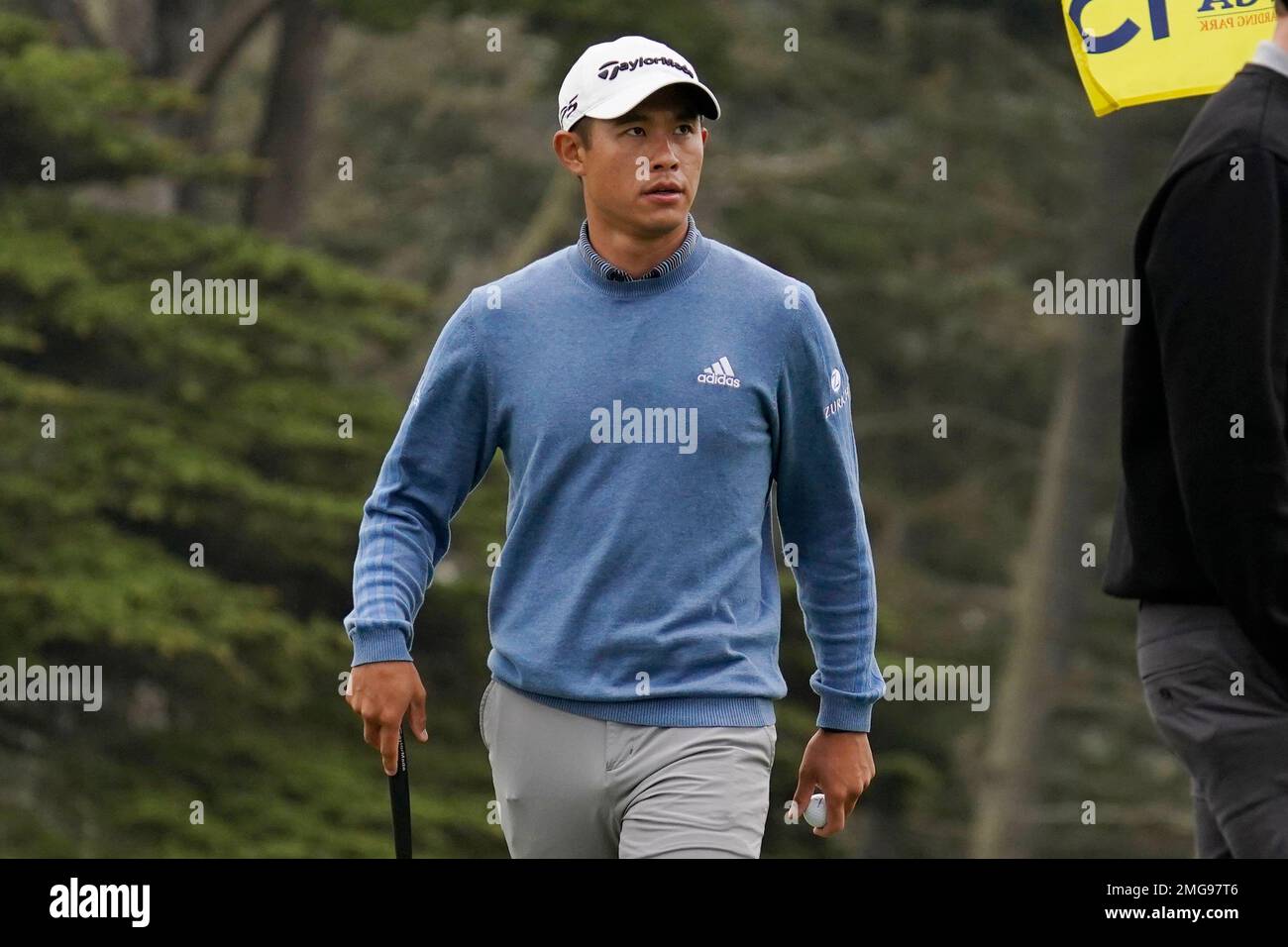 Collin Morikawa walks on the 15th green during practice for the PGA