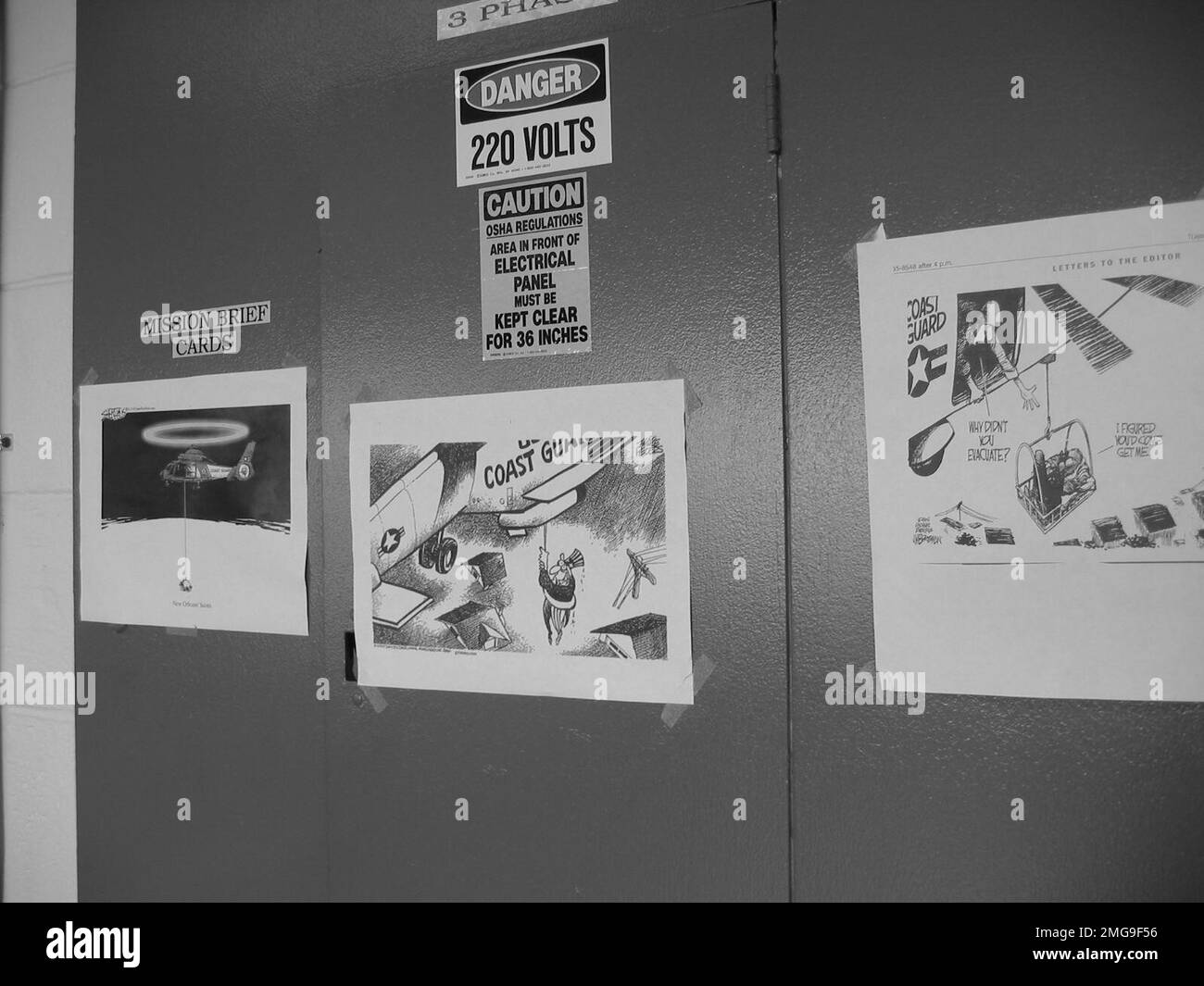 Coast Guard Structures - Air Stations - New Orleans - 26-HK-95-122. AIRSTA NOLA--CG artwork on electric panels. Hurricane Katrina Stock Photo