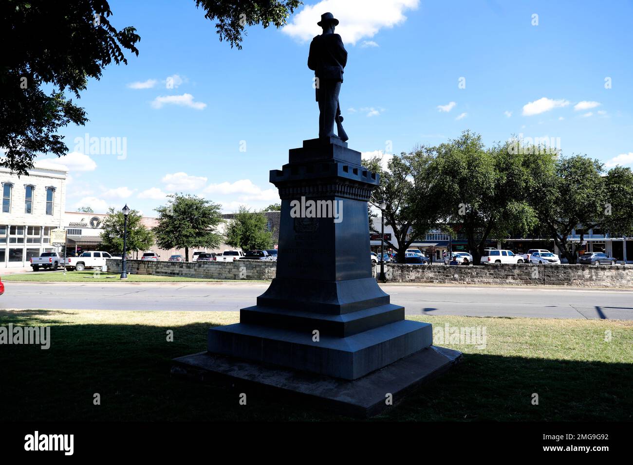 A statue of a Confederate soldier sits outside the Parker County