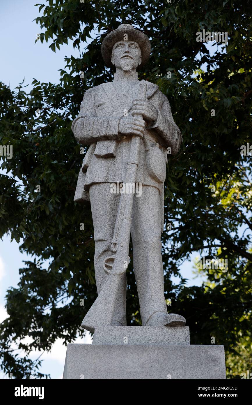 A statue of a Confederate soldier sits outside the Parker County