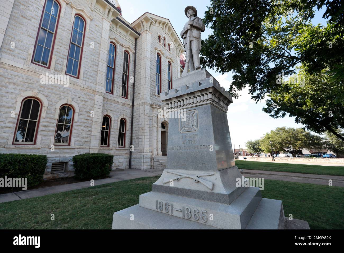 A statue of a Confederate soldier sits outside the Parker County