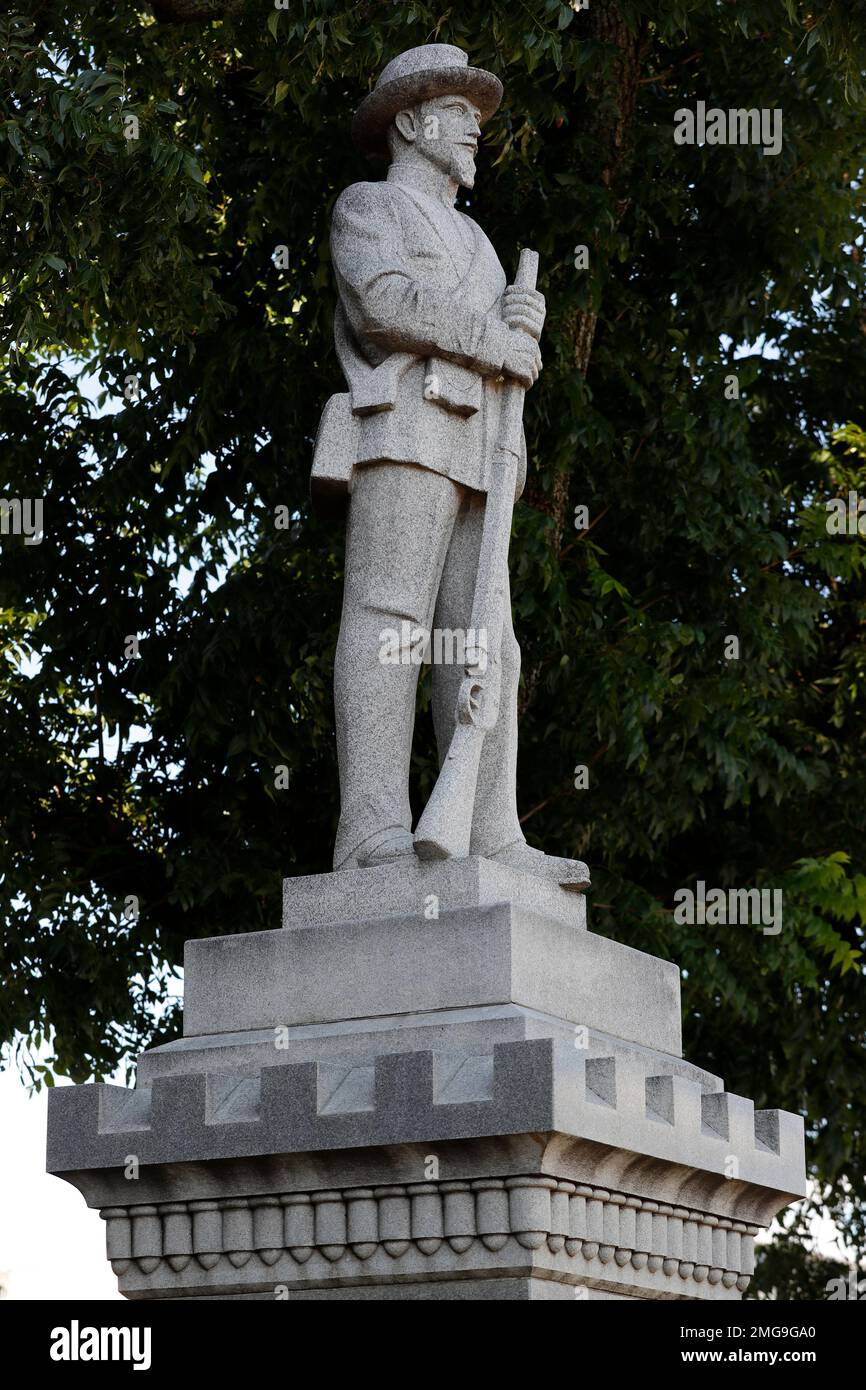 A statue of a Confederate soldier sits outside the Parker County