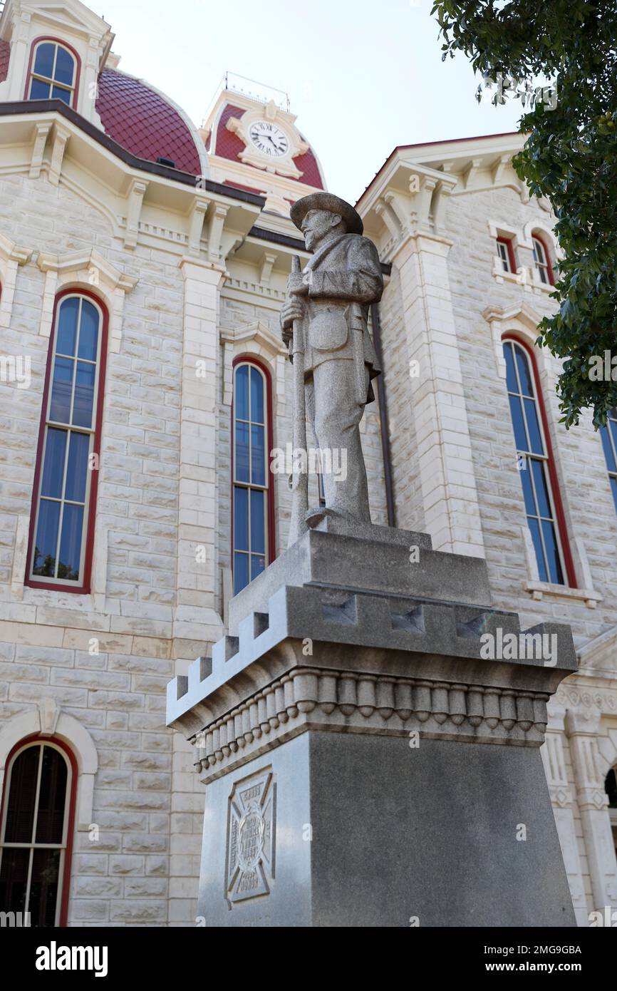 A statue of a Confederate soldier sits outside the Parker County