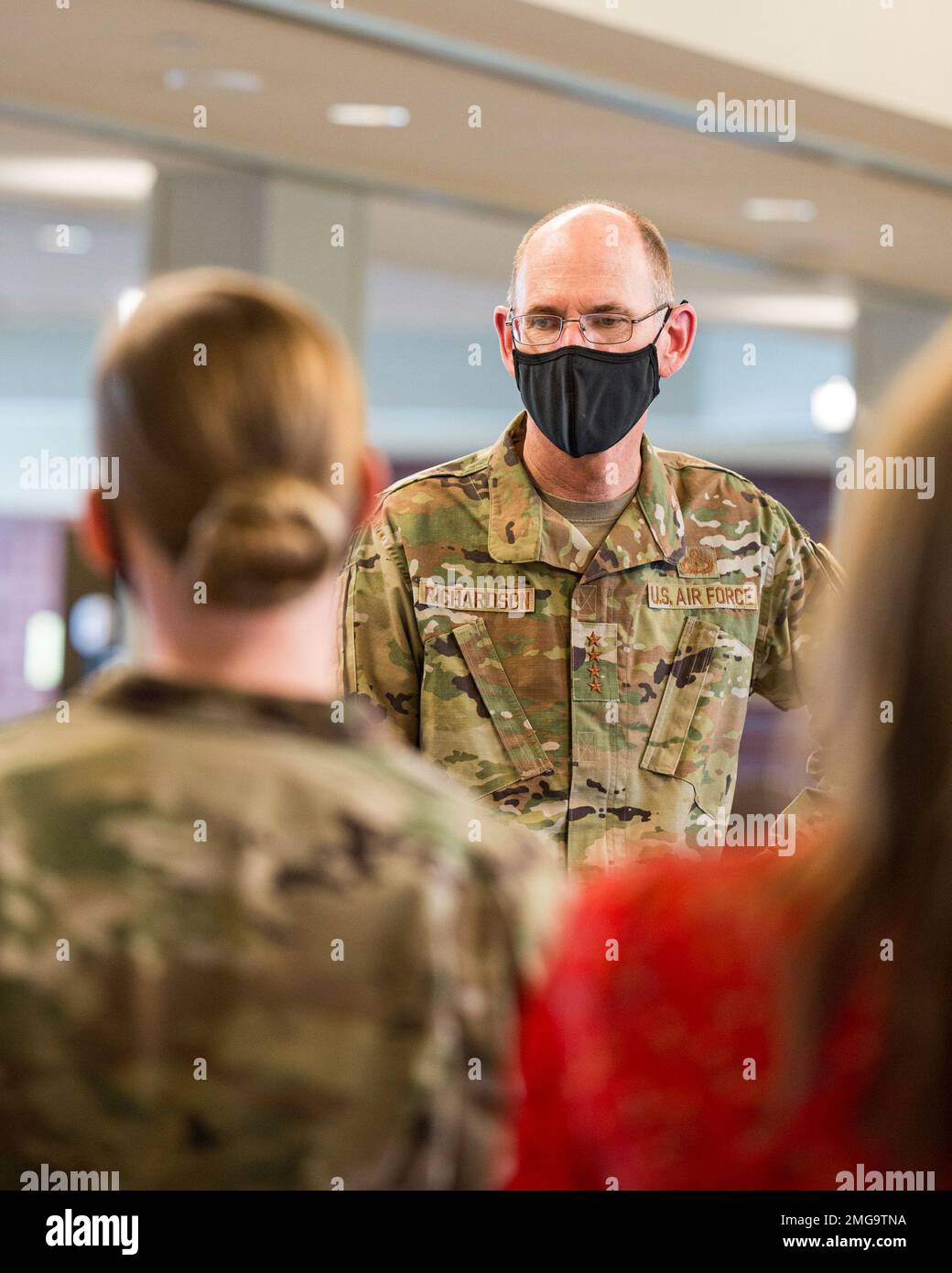 Gen. Duke Z. Richardson, Air Force Materiel Command commander, listens ...