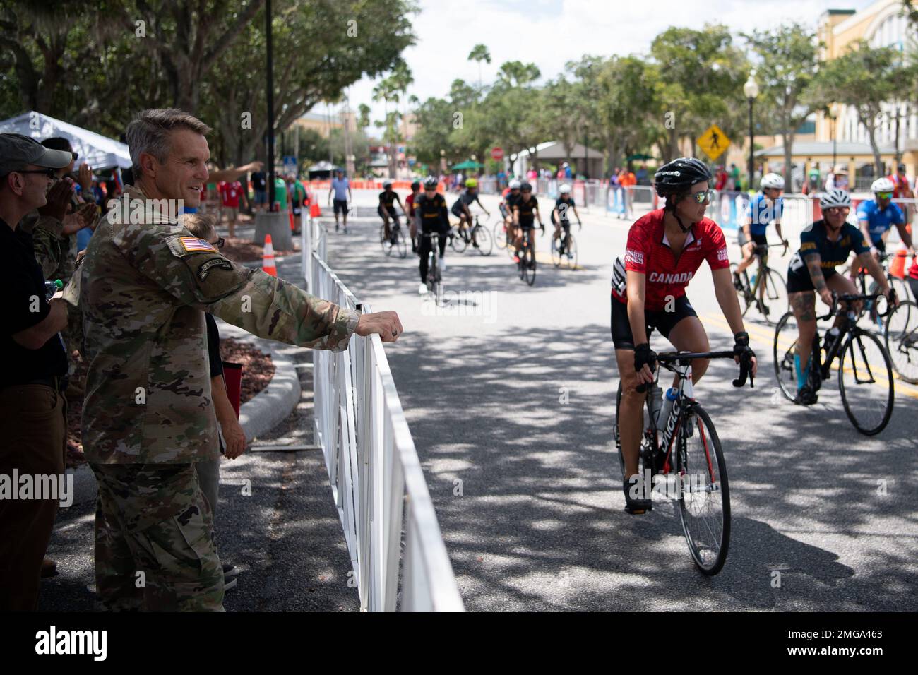U.S. Army General Richard Clarke, commander, United States Special Operations Command (SOCOM) observes cyclists during the DoD Warrior Games on Aug. 23, 2022 at the ESPN Wide World of Sports Complex in Orlando, Florida. General Clarke is making his last visit as SOCOM commander to the DoD Warrior Games to show his support for Team SOCOM and all participants in the games before he relinquishes command on Aug. 30, 2022. (Photo by U.S. Marine Corps Gunnery Sgt. Eric L. Alabiso II) Stock Photo