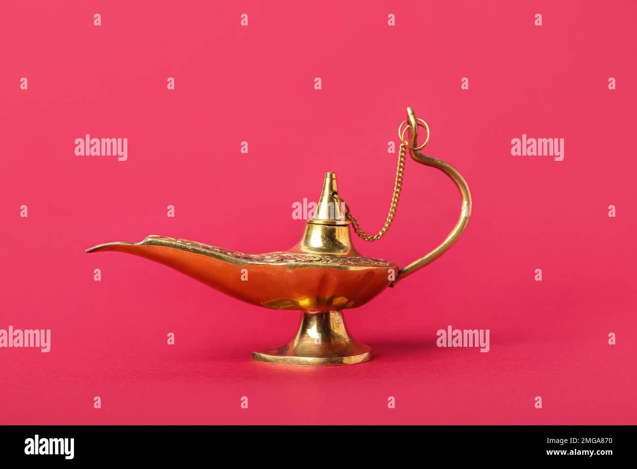 Aladdin lamp of wishes for Ramadan on red background Stock Photo - Alamy