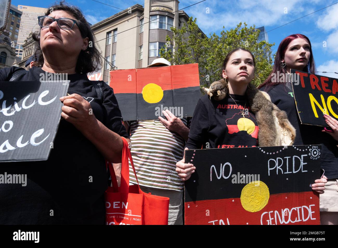 Demonstrators hold placards at the Invasion Day rally in Melbourne, Victoria, Australia. Stock Photo