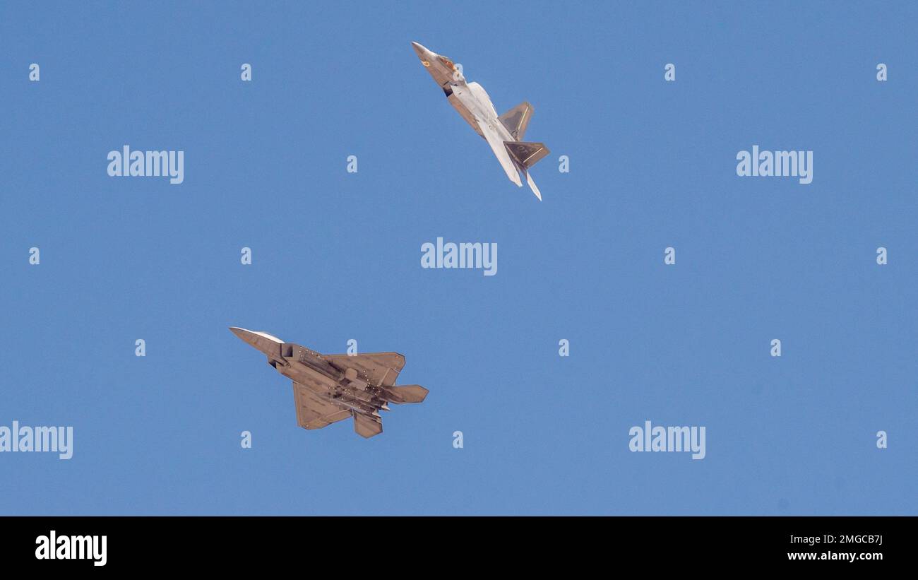 Two F-22 Raptors fly over Edwards Air Force Base, California, Aug. 23 ...