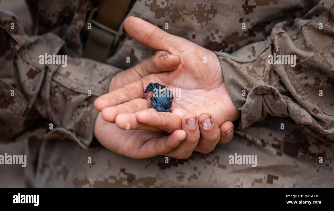 Sgt. First Class Tim Ybay from Long Beach, Calif., with C Company, 1st  Battalion, 26th Infantry Regiment, kneels and reflects after returning to  forward operating base Apache in eastern Baghdad after an