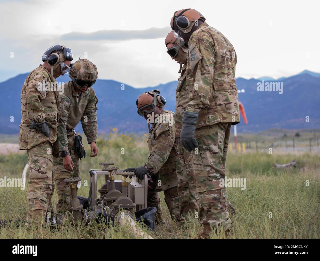 Soldiers assigned to 404th Aviation Support Battalion, 4th Combat Aviation Brigade, 4th Infantry Division fixes fuel distribution equipment at Fuel System Supply Point or FSSP, Fort Carson, Colorado, Aug. 24, 2022. The FSSP is the Army's primary means for the receipt and storage of bulk petroleum and for its issue to combat forces under tactical conditions. Stock Photo