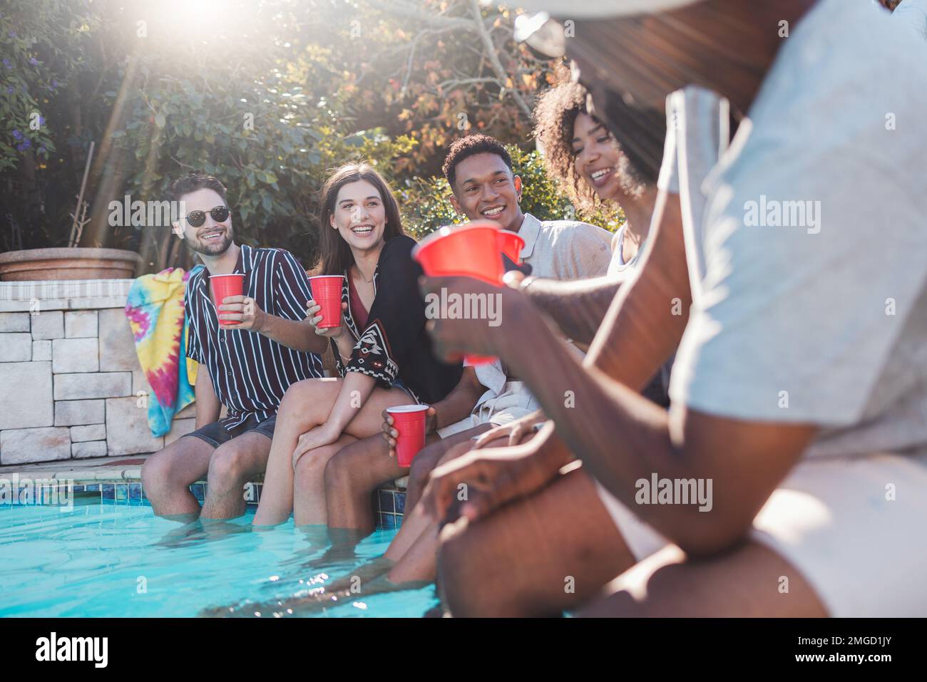 Pool party with sangria pitcher, fruit cocktails and refreshments by the  swimming pool. Summer lifestyle, topical vacation, fun and relaxation theme  Stock Photo - Alamy
