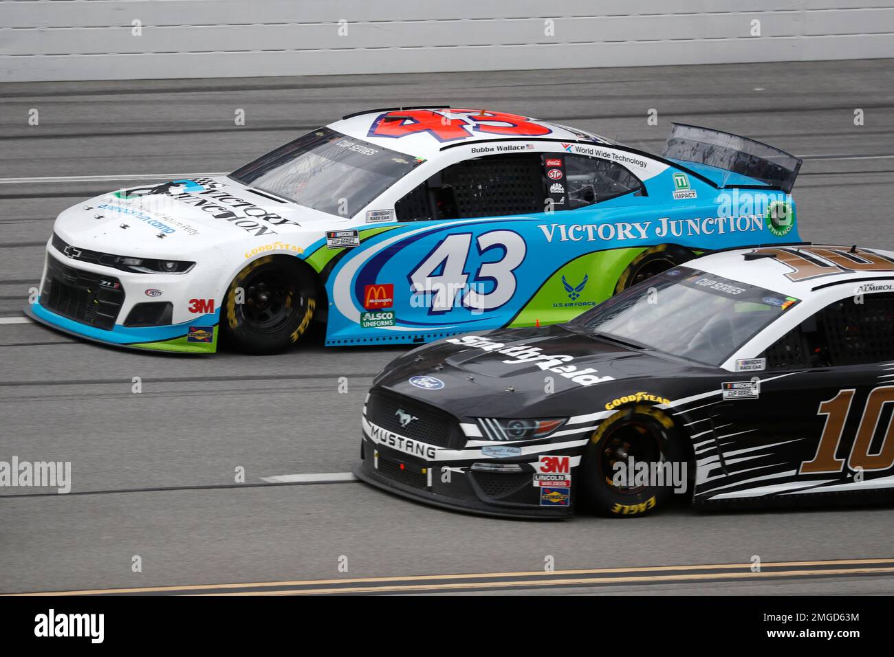 Bubba Wallace (43) and Aric Almirola (10) race side-by-side during a NASCAR Cup Series auto race at Talladega Superspeedway in Talladega Ala., Monday, June 22, 2020