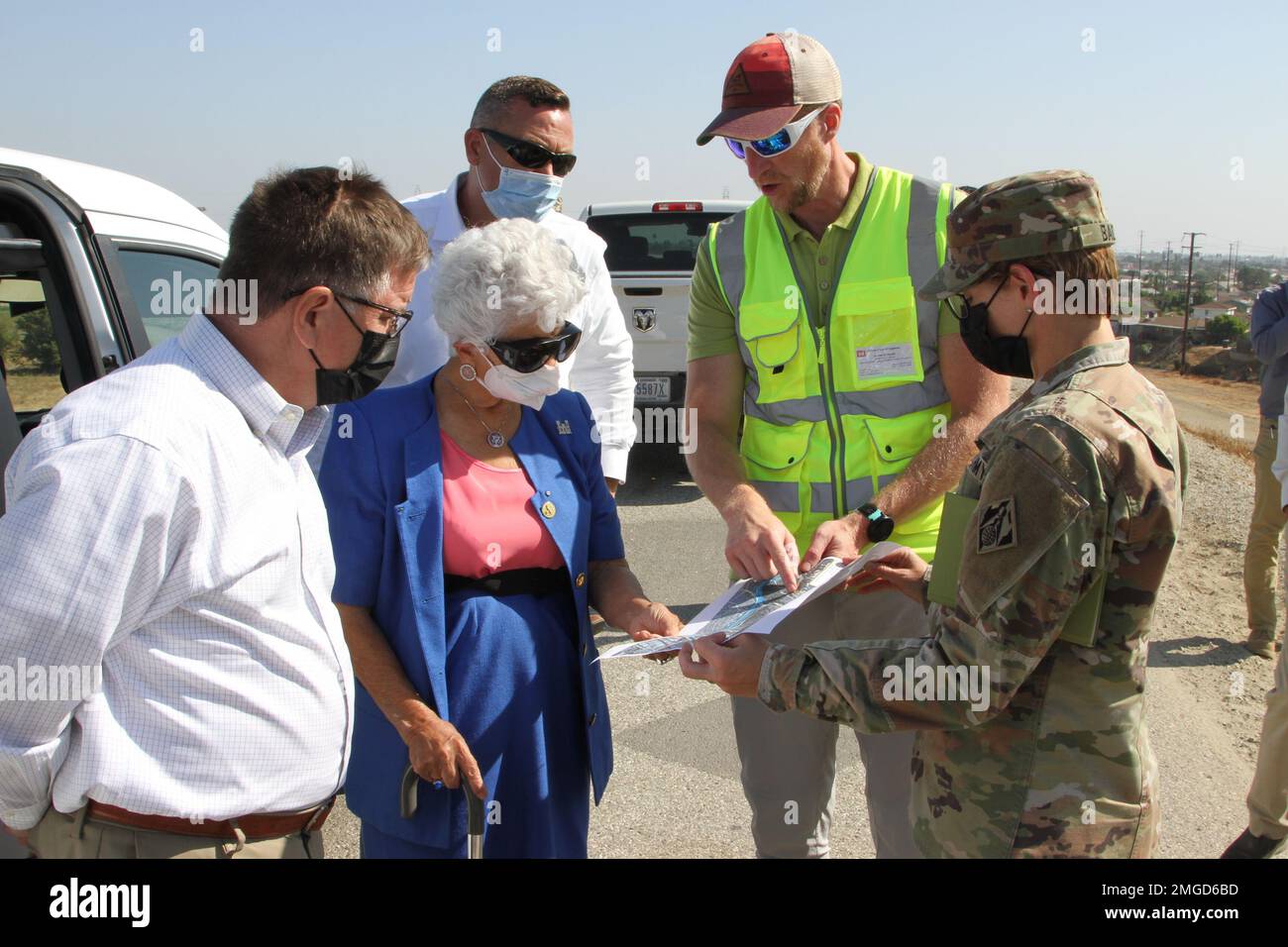 Col. Julie Balten, LA District commander, right, and Aaron Smith