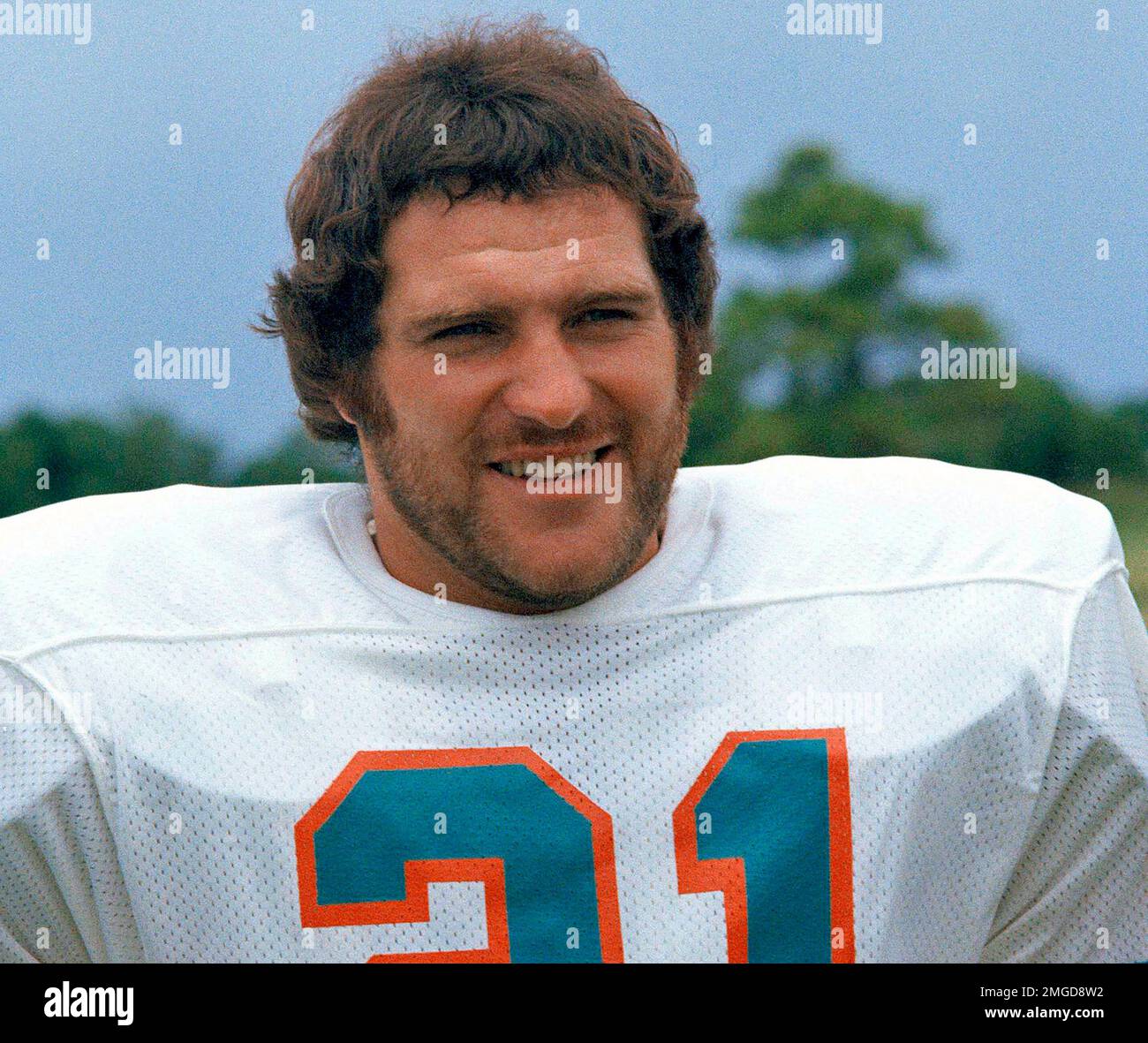 A photograph on display of former Miami Dolphins running back Jim Kiick,  full back Larry Csonka, center, and running back Mercury Morris, right, at  Independence Hall assisted living facility in Wilton Manors