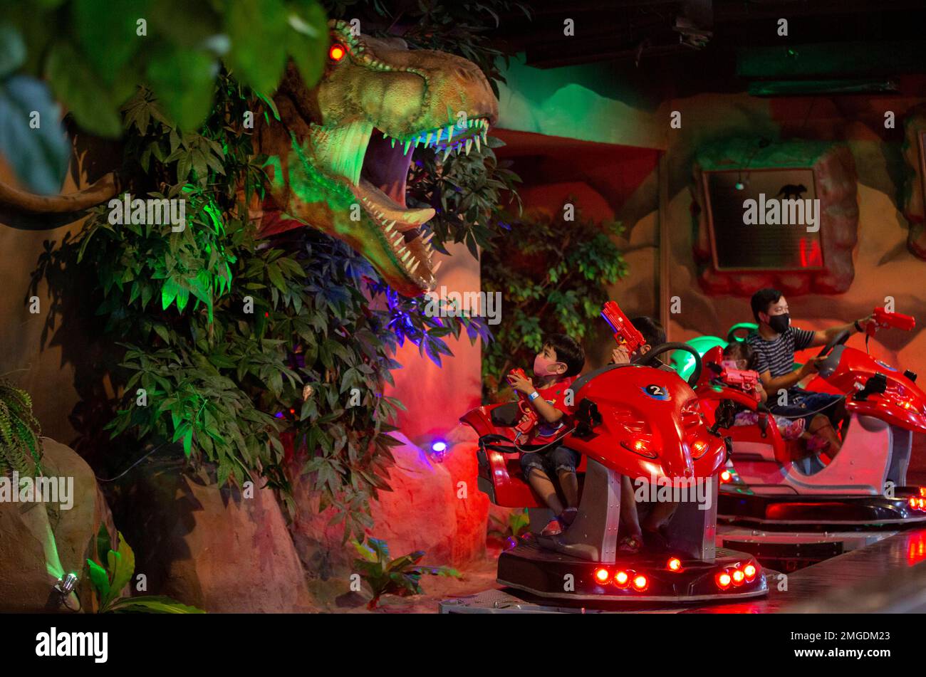 Visitors enjoy rides in Yoyo Land, an indoor amusement center in Bangkok,  Thailand, Tuesday, June 16, 2020. Daily life in capital resuming to normal  as Thai government continues to ease restrictions related