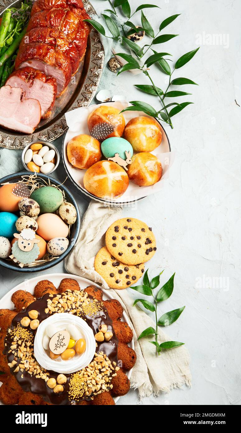 Classic Easter ham dinner. Top view table scene on a white background