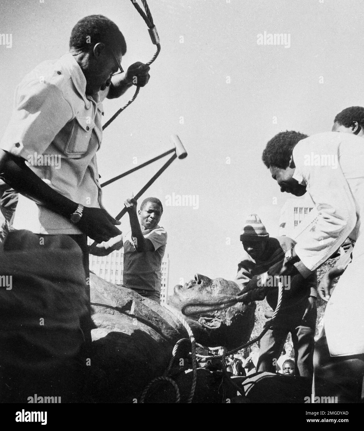 FILE In this July 31, 1980, file photo, Rhodesians beat a statue as