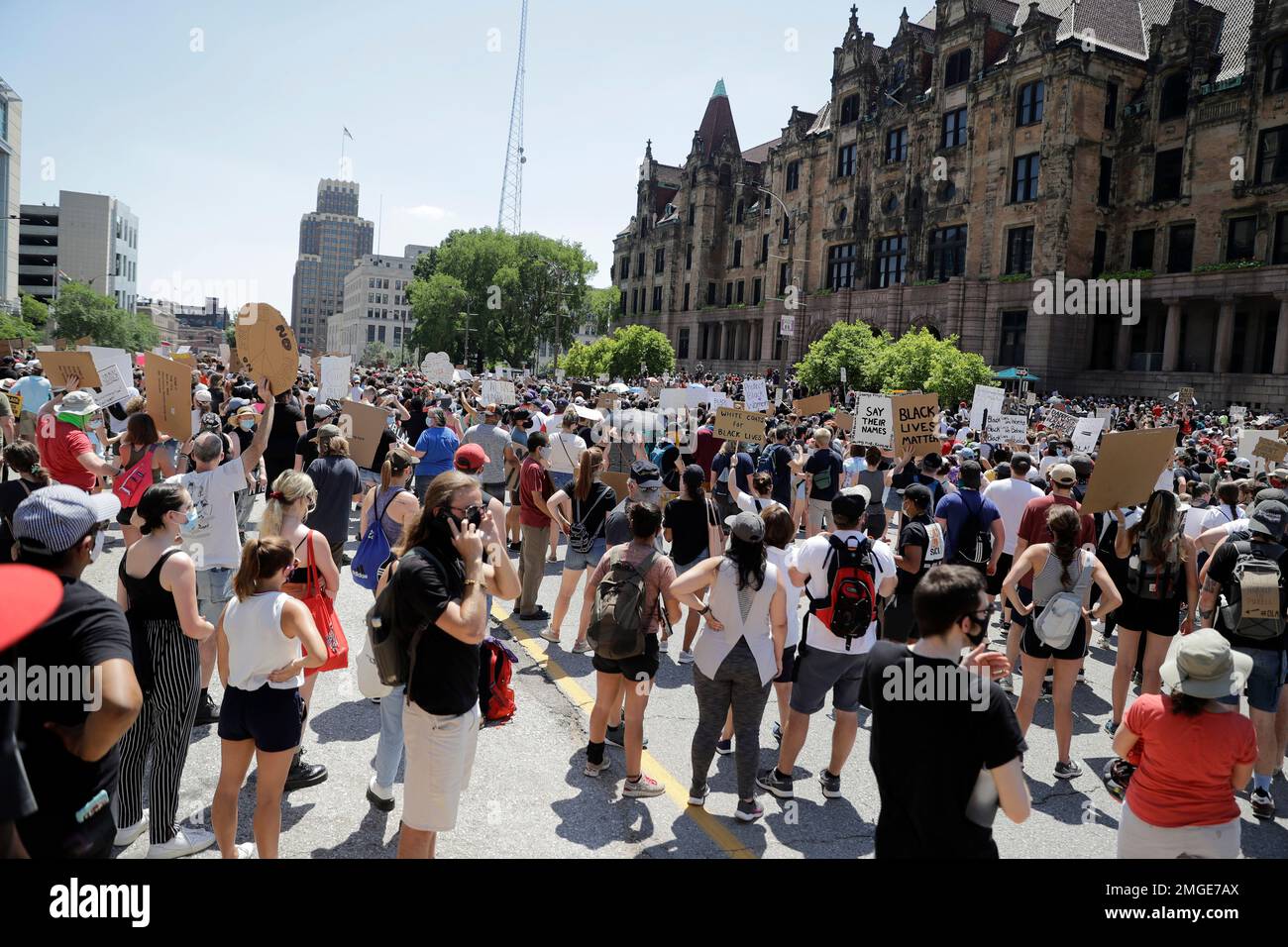 Several thousand protesters gather outside city hall before marching to ...