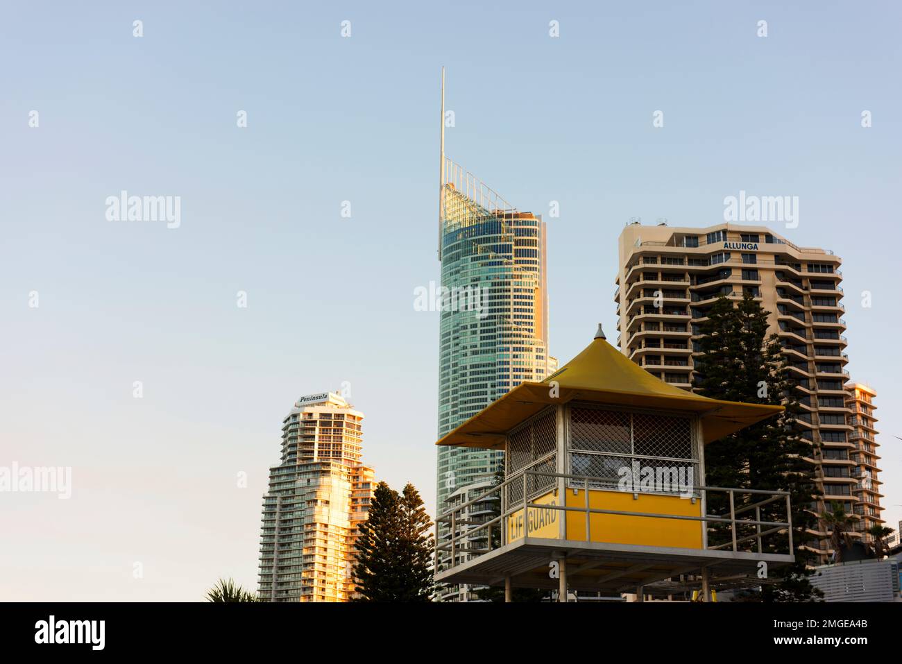 Surf lifesaver hut on the beach at Surfers Paradise with high rise apartment buildings in background. Stock Photo