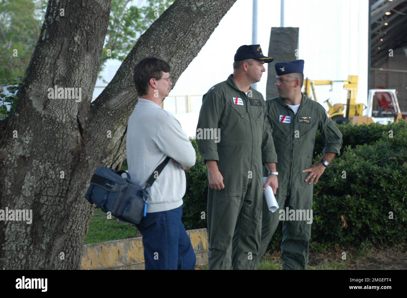 Congressional Delegation Oversight Visit - 26-HK-7-170. USCG personnel outside hangar at ATC. Hurricane Katrina Stock Photo