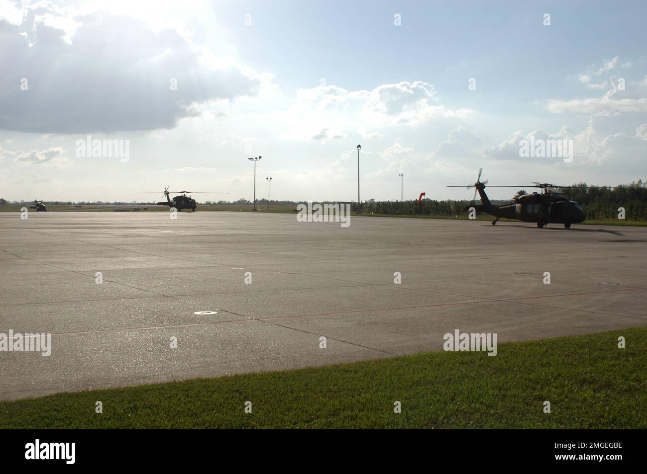 Congressional Delegation Oversight Visit - 26-HK-7-134. Military helicopters on ATC ramp. Hurricane Katrina Stock Photo
