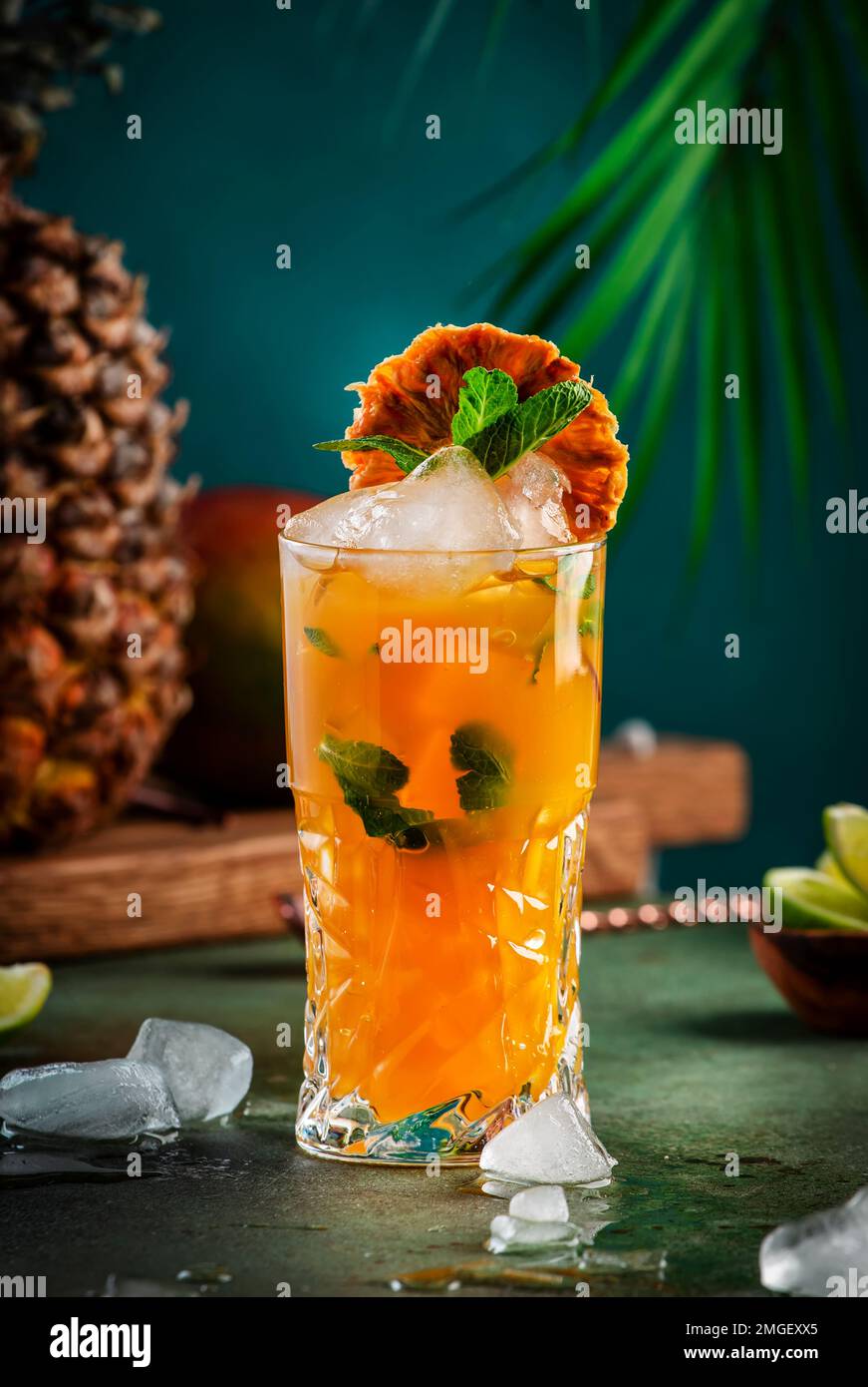 Alcoholic cocktail with vodka, pineapple juice, mango, liquor, ice. Long drink or summer cold