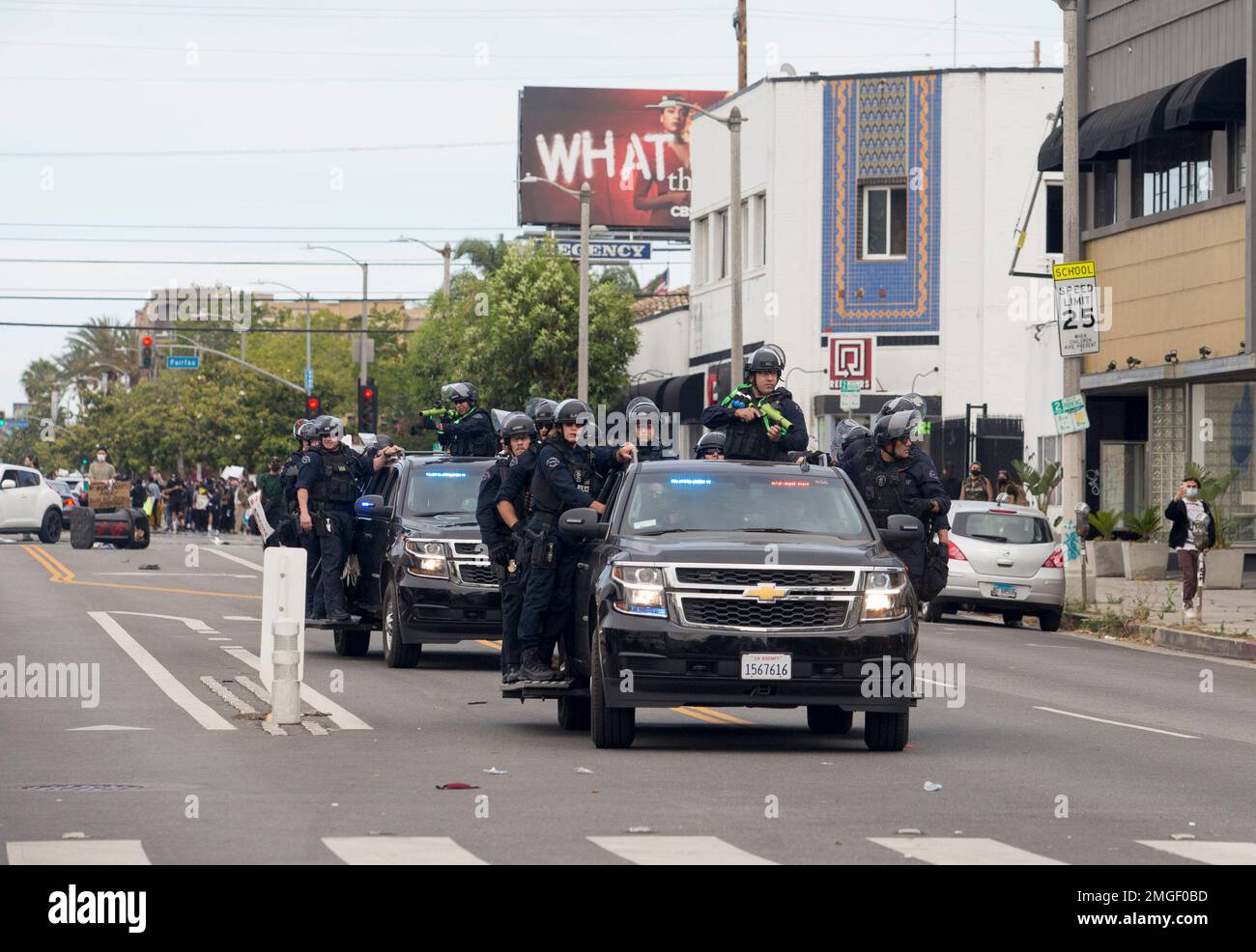 LAPD riot police clear the streets during a protest over the death of ...